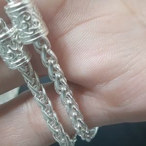 Silver necklace and bracelet set.